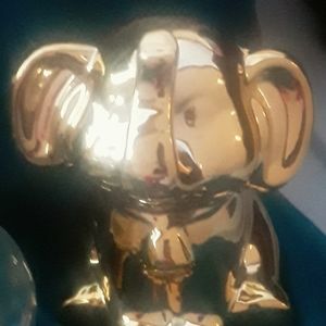 Little elephant coin bank gold in color